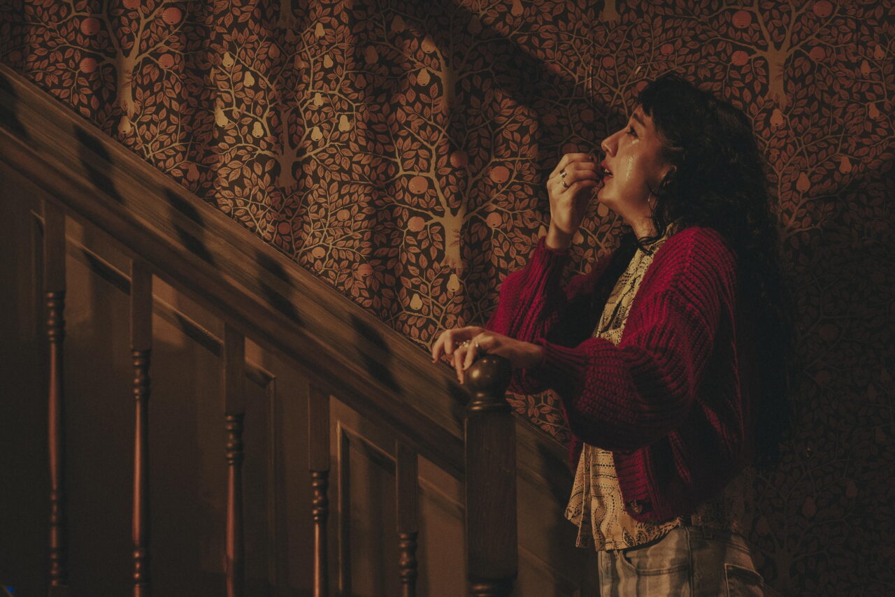 Cher Álvarez stars as Lou, part of a couple being haunted in the play Paranormal Activity.
