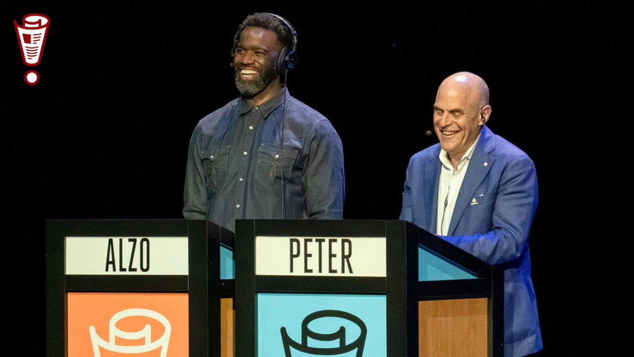 Alzo Slade and Peter Sagal on stage at the Studebaker Theater in Chicago