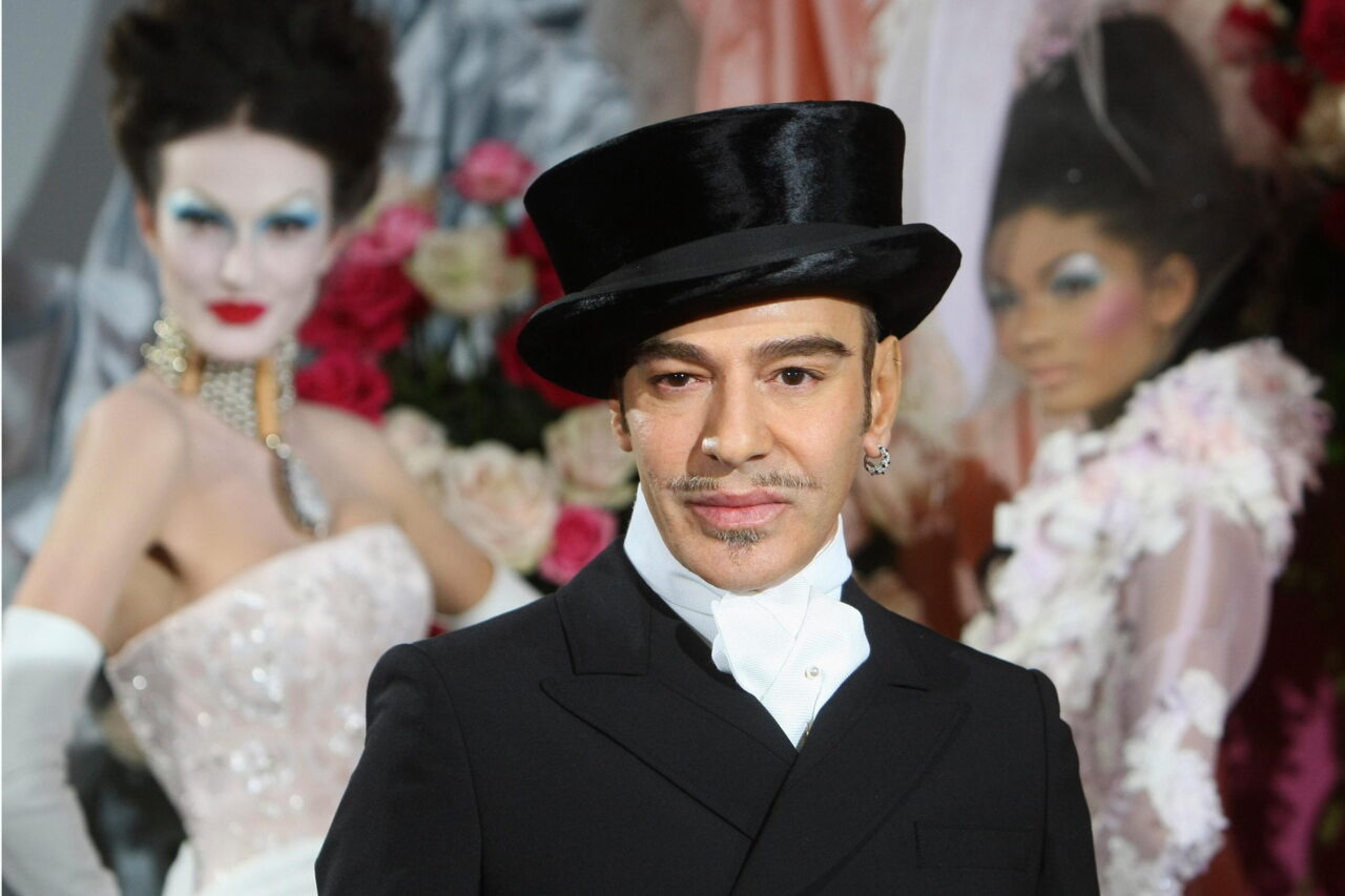 FILE - Fashion designer John Galliano poses at the end of the presentation of the Dior Haute Couture spring/summer 2010 fashion collection on Jan. 25, 2010, in Paris.