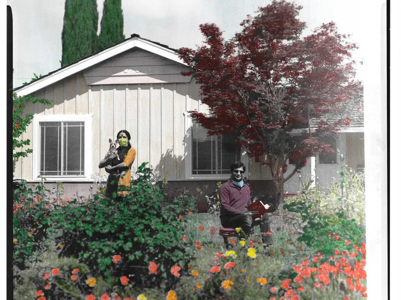 Nitya Kansal (left) and her husband, Arvind Kansal (right), pose in front of their home in Cupertino, Calif.