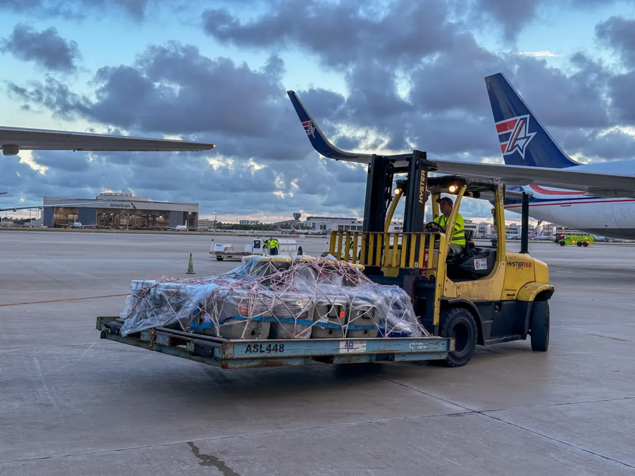 Florida reefs are in trouble. Could the answer lie in coral from the Caribbean? 5 A forklift at Miami International Airport moves coolers containing elkhorn and brain coral shipped to Miami from Honduras in June.