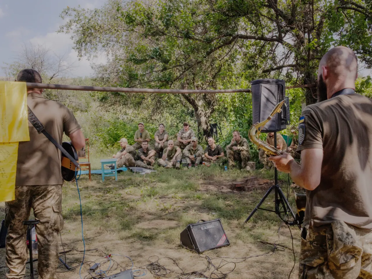 How these Ukrainian artists are using their talents to support the war effort 14 A band of soldiers plays a concert for soldiers near the front lines in eastern Ukraine’s Donbas region.