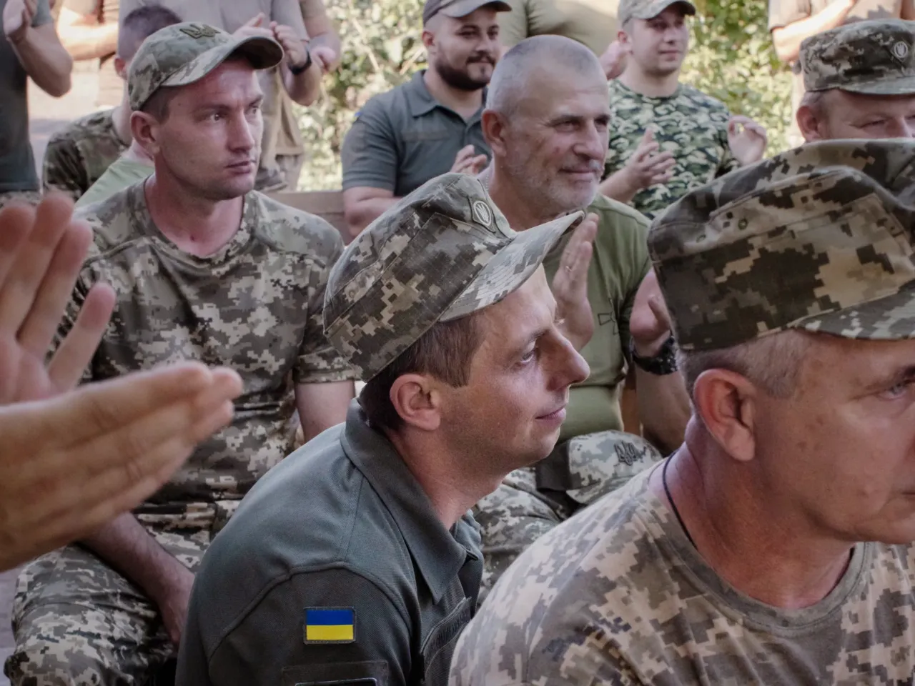 How these Ukrainian artists are using their talents to support the war effort 16 Soldiers listen as Bandura player Maria Petrovska plays as part of a concert for soldiers near the front lines in eastern Ukraine's Donbas region.