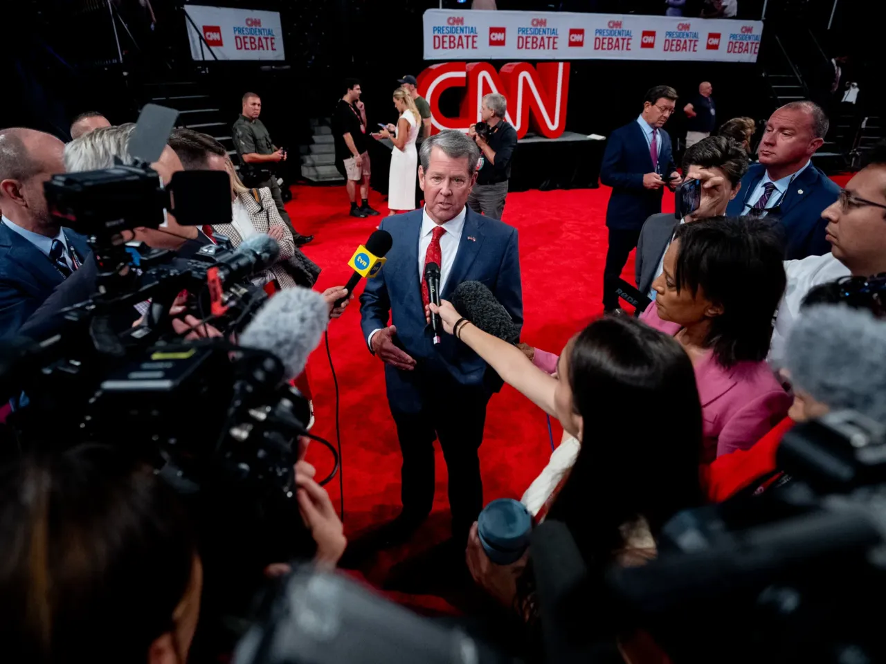 Georgia Gov. Brian Kemp speaks to reporters ahead of a CNN Presidential Debate on June 27, 2024, in Atlanta.