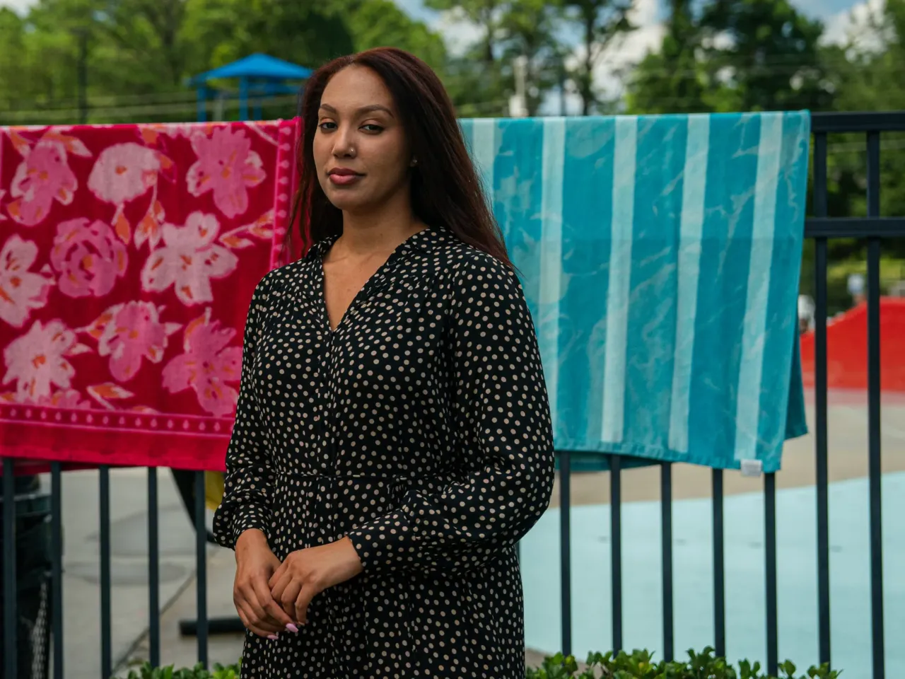 Deanna McKay says she has decided to sit out voting in the presidential race after watching last month's debate. McKay poses for a photo at the Wills Park Pool in Alpharetta, Ga.
