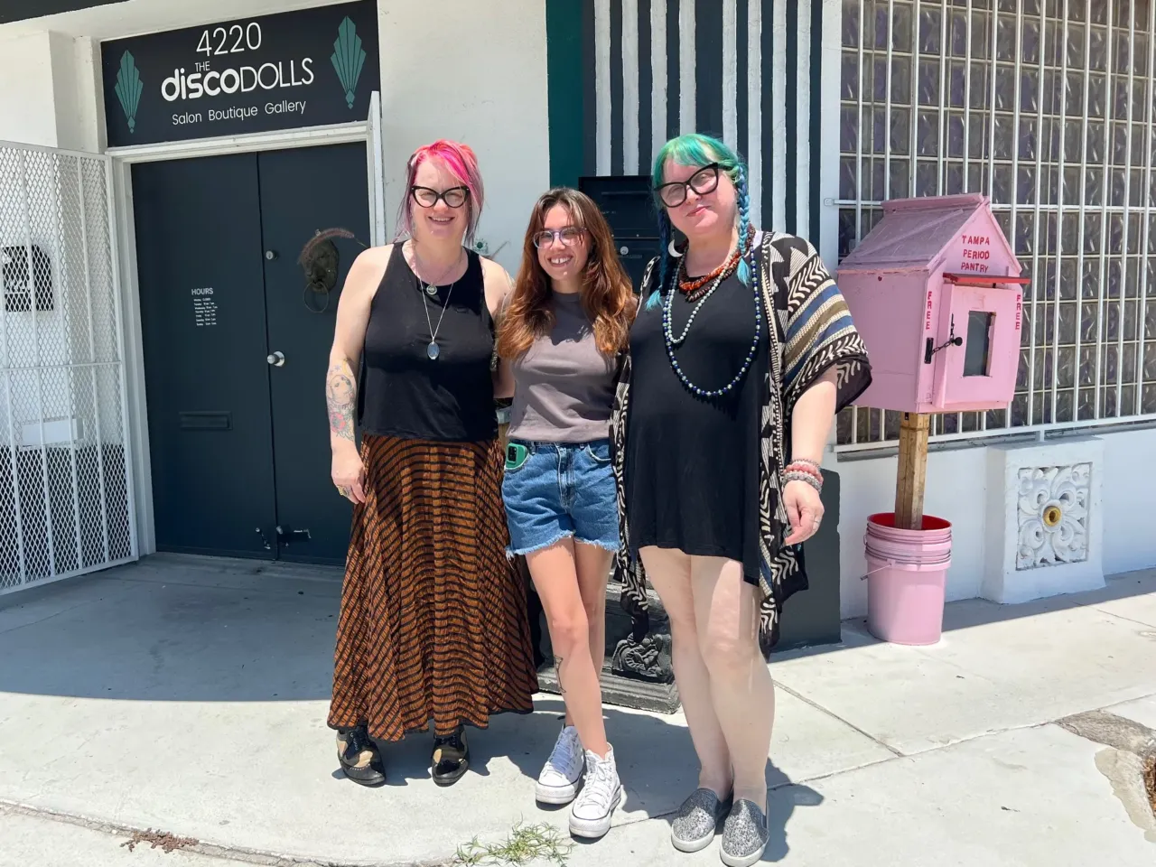 Tampa Period Pantry founder Bree Wallace (center) worked with co-owners of the Disco Dolls Studio in Tampa, Leigh Anne Balzekas (right) and Kristine Ownley (left) to open the first location outside the business last August. The store also has a donation box inside where customers can drop off products.