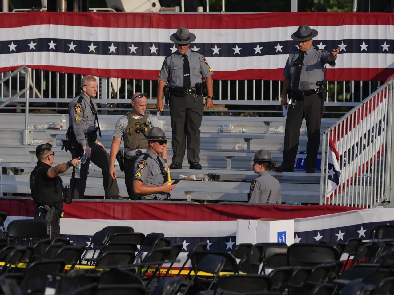 Photos: See how the Trump rally shooting unfolded 12 Law enforcement officers gather at the campaign rally site for Republican presidential candidate former President Trump.