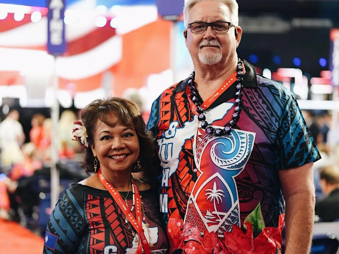 Fashion meets politics on the RNC's red carpet 3 Sam Mabini Young, delegate from Guam, poses for a portrait next to her husband Mel Young on this final day of the Republican National Convention.