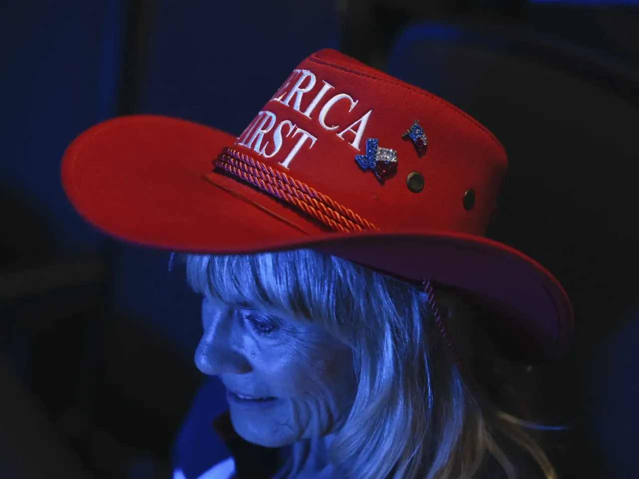 People watch the Republican vice presidential nominee J.D. Vance speak during the third night of the RNC, in Milwaukee, Wisc., on July 17.
