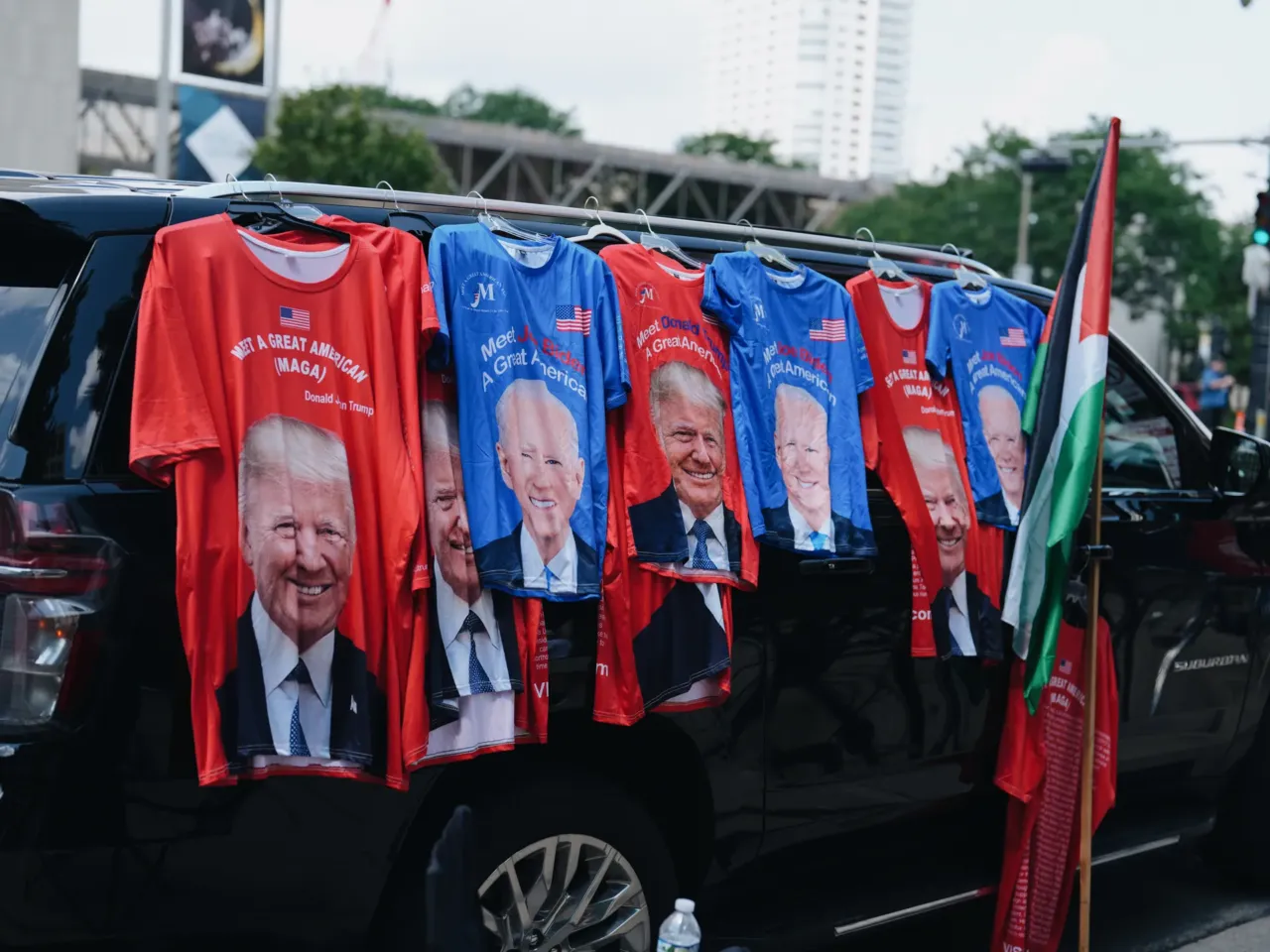 During the March on the RNC, a Palestinian flag leans against a car showcasing merchandise for sale on the first day of the 2024 Republican National Convention in Milwaukee, Wisconsin, July 15, 2024.