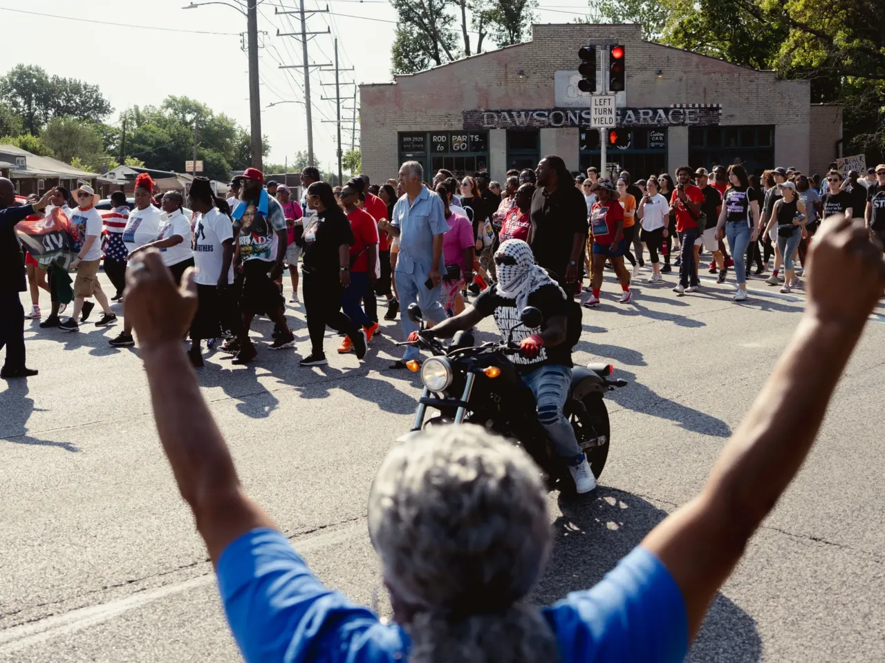 Protestors march in the streets during a unity march.