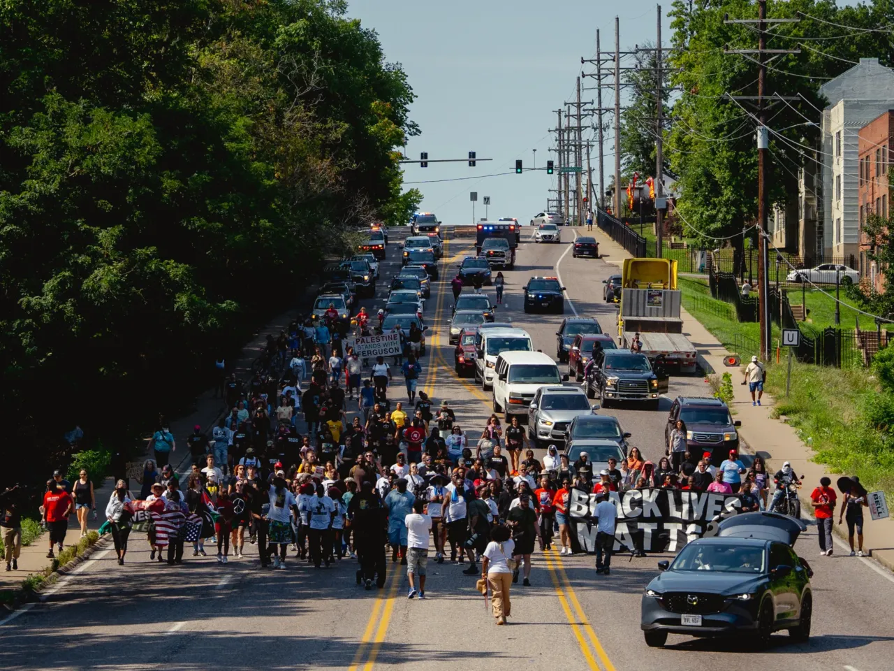 Hundreds of demonstrators take to the streets, during a unity march commemorating a decade after Michael Brown Jr.’s police killing in Ferguson.