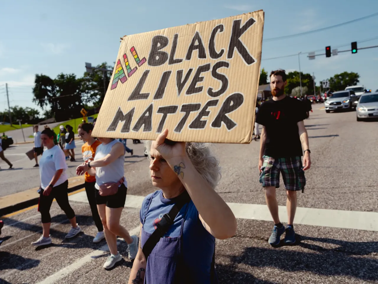 Angelique Kidd, 51, of Ferguson, protests during the unity march.