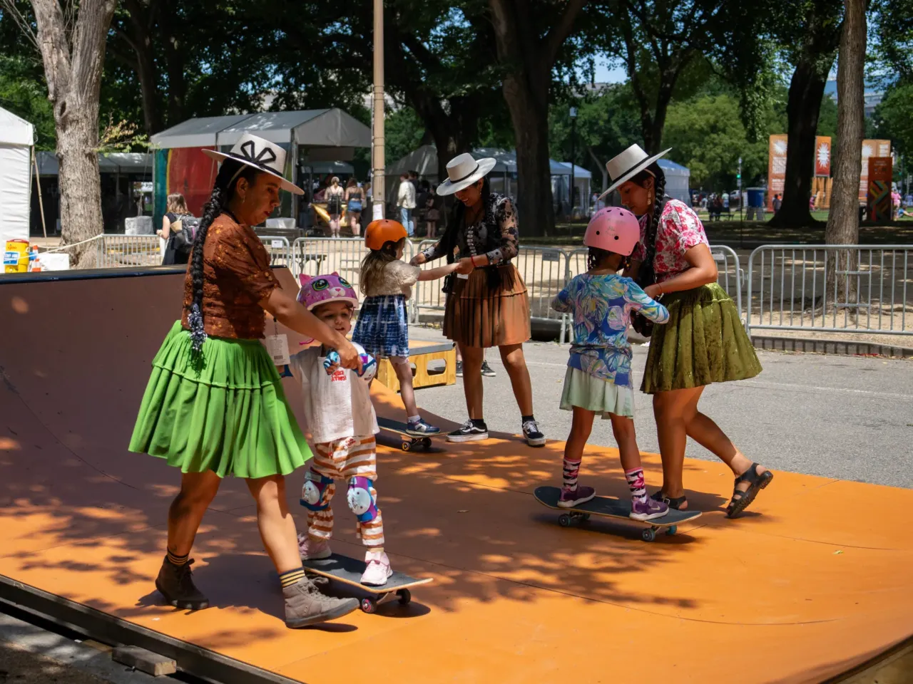 Whatever happened to ... the Bolivian women who skateboard in Indigenous garb? 1 Bolivian skateboarders instruct kids in the art of skateboarding at the 2024 Smithsonian Folklife Festival. They tell youngsters that the skateboarding philosophy is "When you fall, you have the power to get back up."