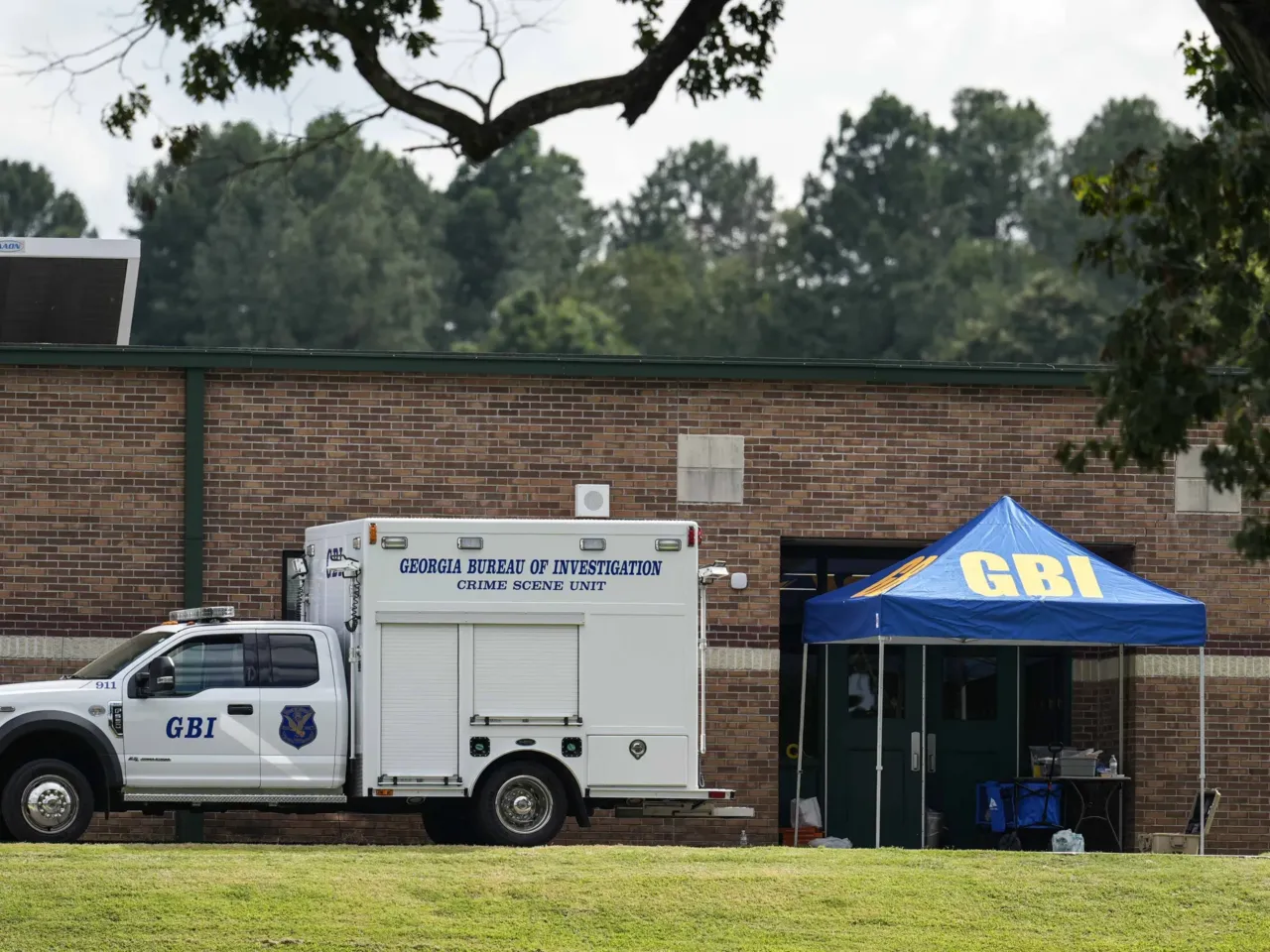 Georgia Bureau of Investigation staff move through an entrance to Apalachee High School in Winder, Ga., on Thursday.