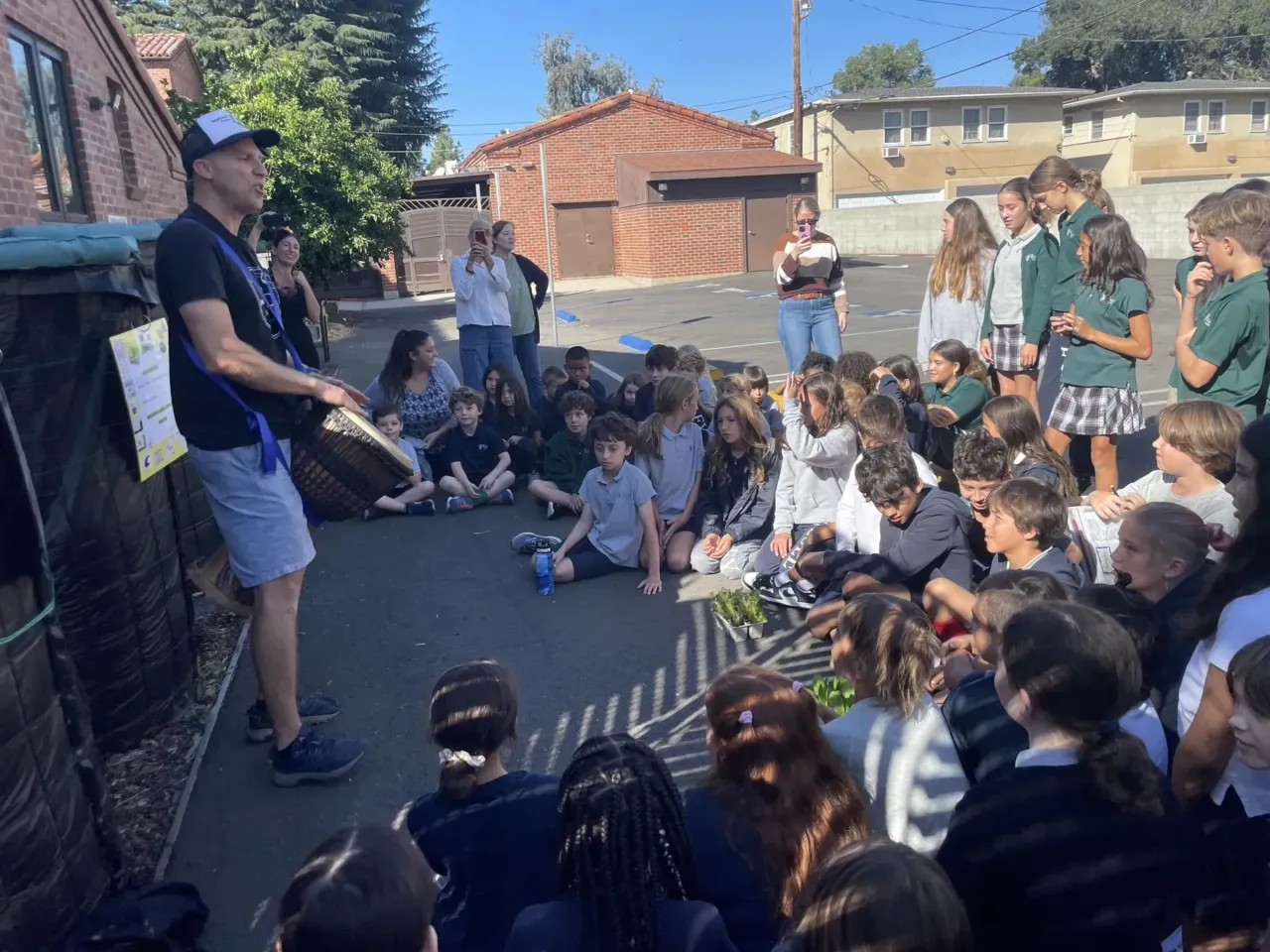 Creative ways communities are reducing food waste 2 Steven Wynbrandt leads students at The Wesley School through its first-ever compost harvesting ceremony.
