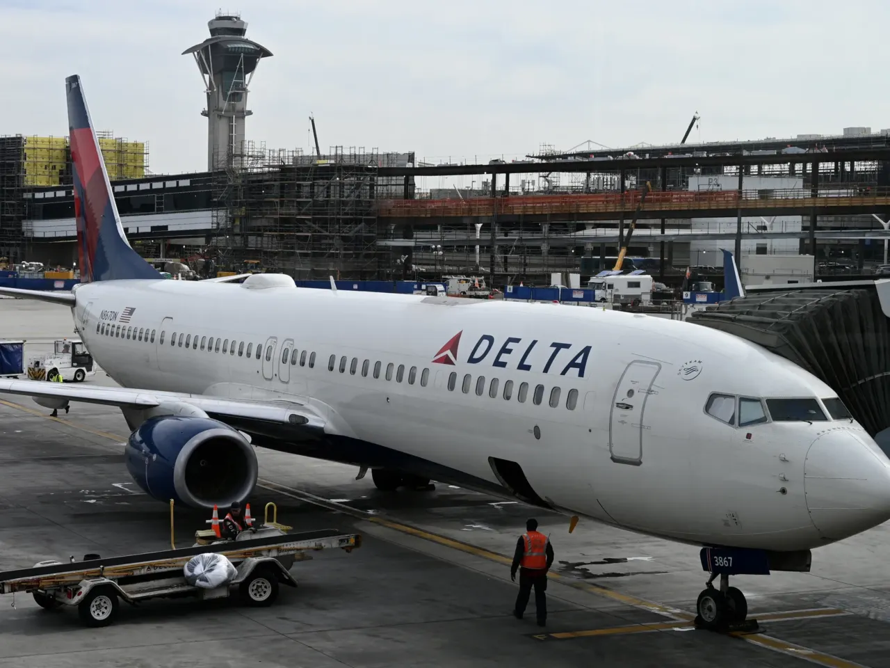 A Delta Air Lines plane is seen at Los Angeles International Airport on Jan. 11, 2023. Earlier this week, a cabin pressurization issue aboard a Delta flight caused a number of passengers to bleed from the nose and ears.