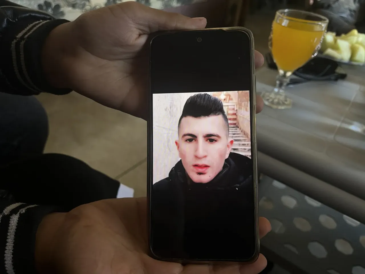 An NPR investigation: A murder in Hebron 1 A photo of Ahmad Abu Markhiya is displayed on a relative's phone.