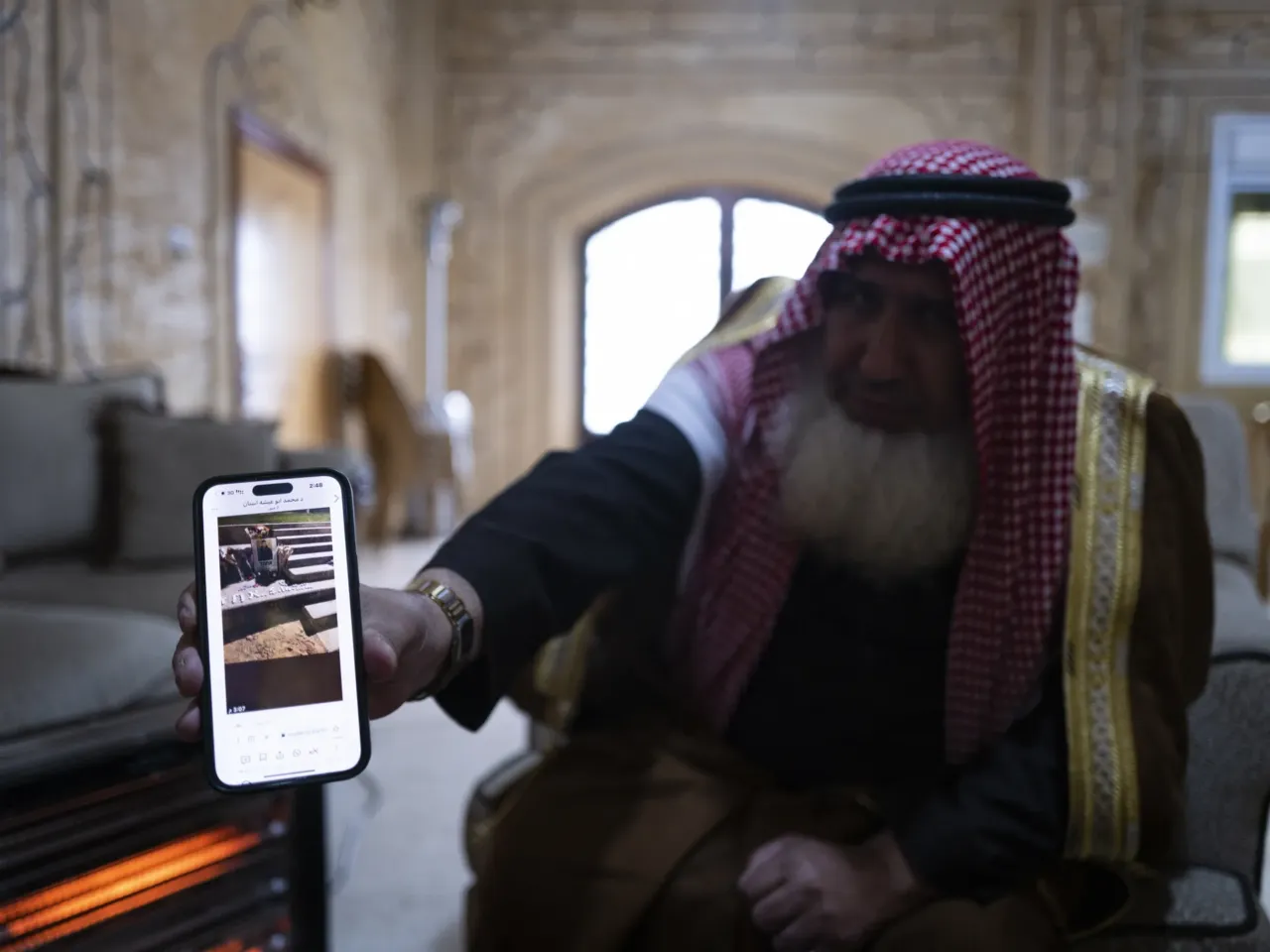An NPR investigation: A murder in Hebron 13 Sheikh Walid Tawil shows a picture of a memorial to Abu Markhiya by gay Palestinian asylum-seekers and their Israeli advocates in Tel Aviv. "We cannot allow any homosexual person to have any kind of rights in society," he said.
