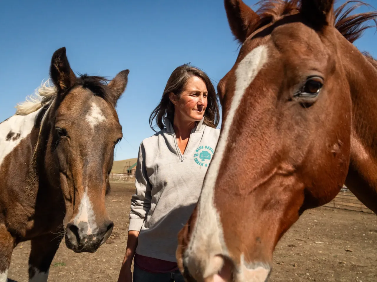 'That's a bloodbath': How a federal program kills wildlife for private interests 5 Hilary Zaranek with her horses at one of her family's ranches near Melville, Mont.