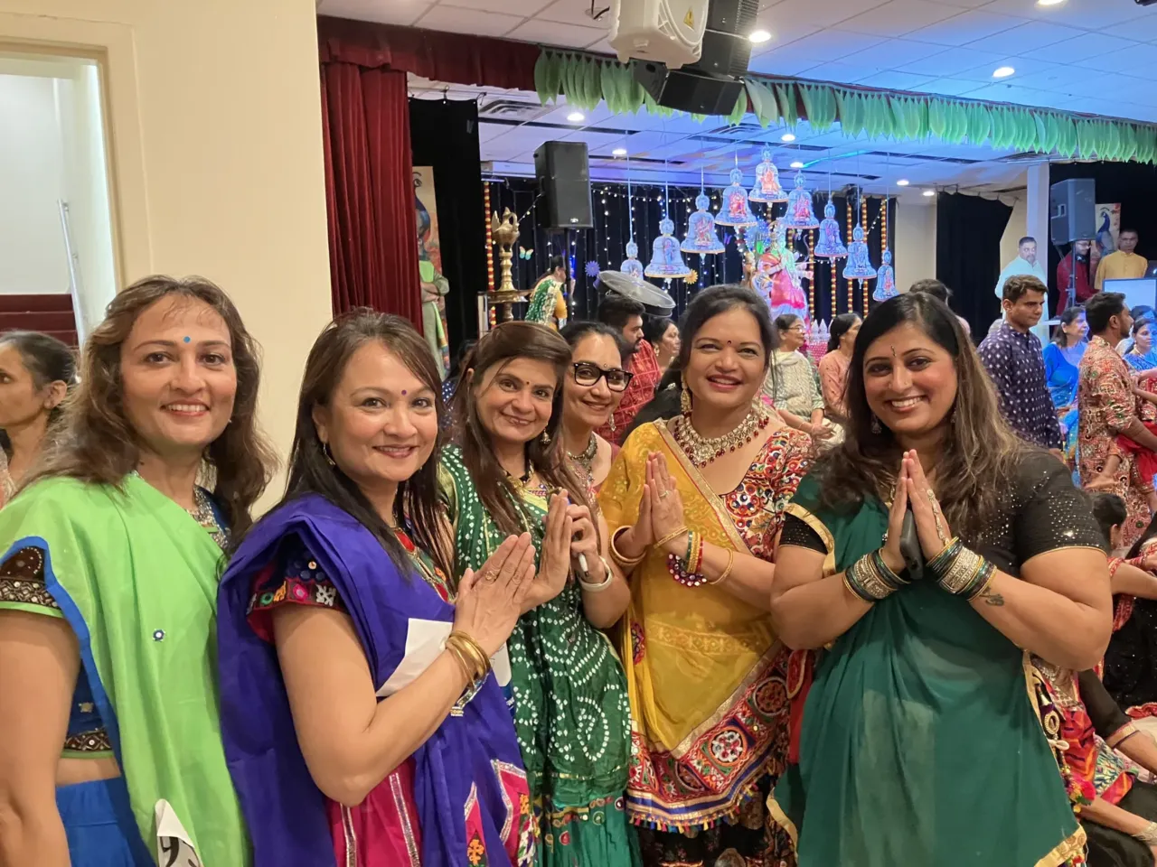 How to pass along religious traditions (without embarrassing your teenagers) 2 Women gathered together at the Bharatiya Temple's Navaratri celebration in Chalfont, Pennsylvania.