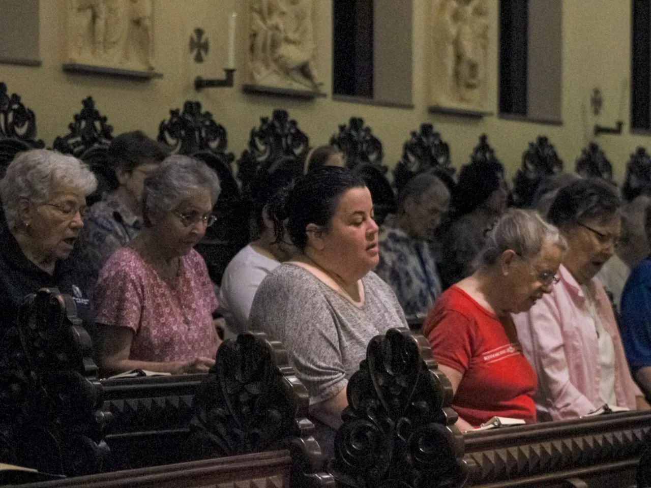Why these nuns have filed more than 350 shareholder resolutions 1 The Benedictine Sisters of Mount St. Scholastica gather for morning prayers in the monastery's chapel.