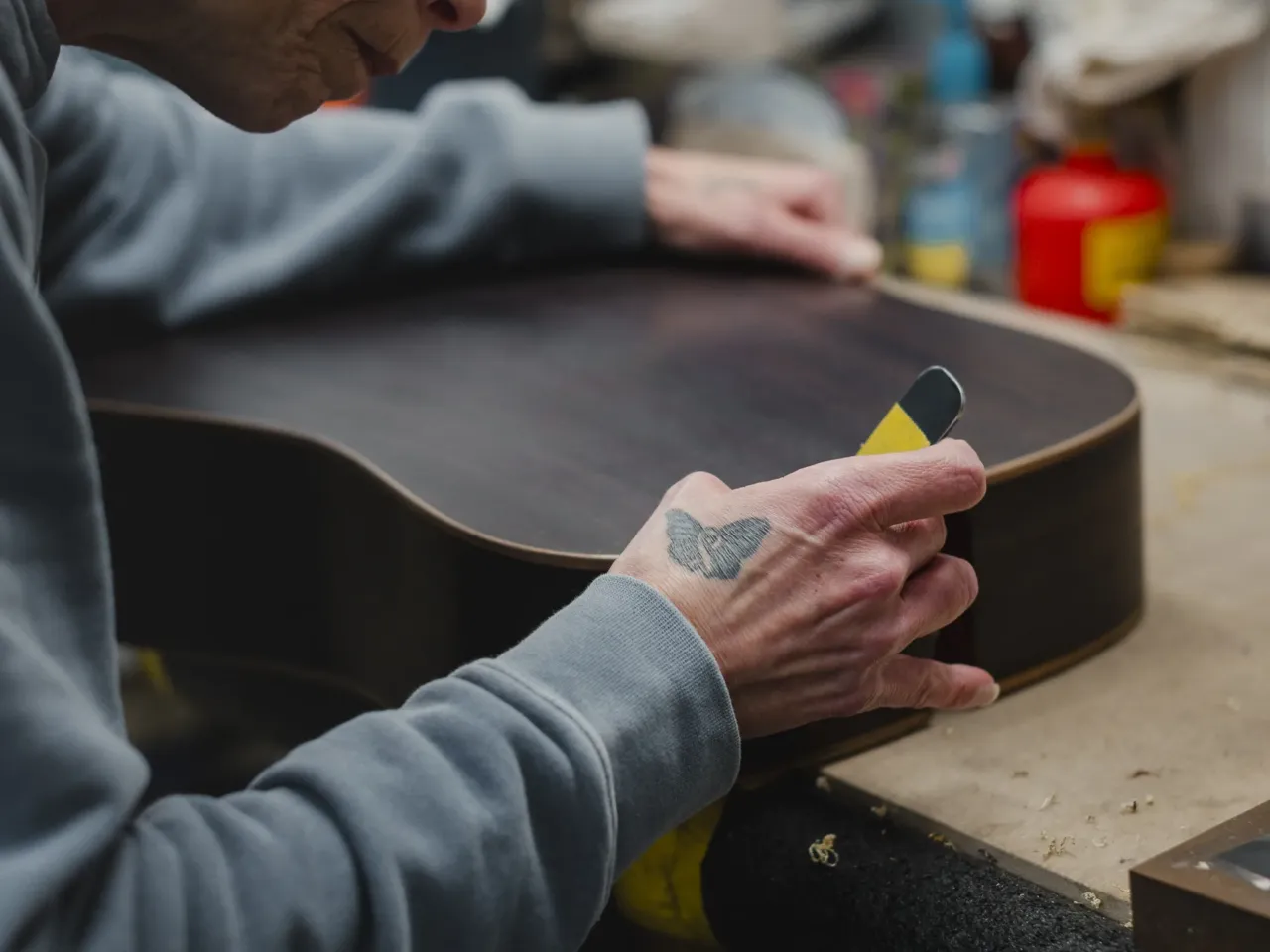 Another reason Pennsylvania is a swing state has nothing to do with the election 3 Tina Saginario cleans the guitar binding. Much of the Martin & Co. finishing work is done by hand.