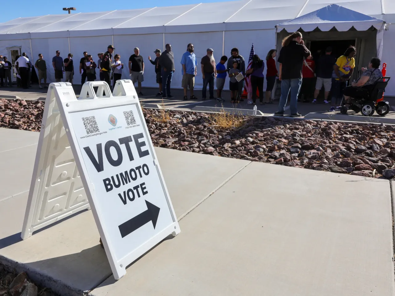 People line up to vote on the first day of in-person early voting in Las Vegas on Oct. 19.