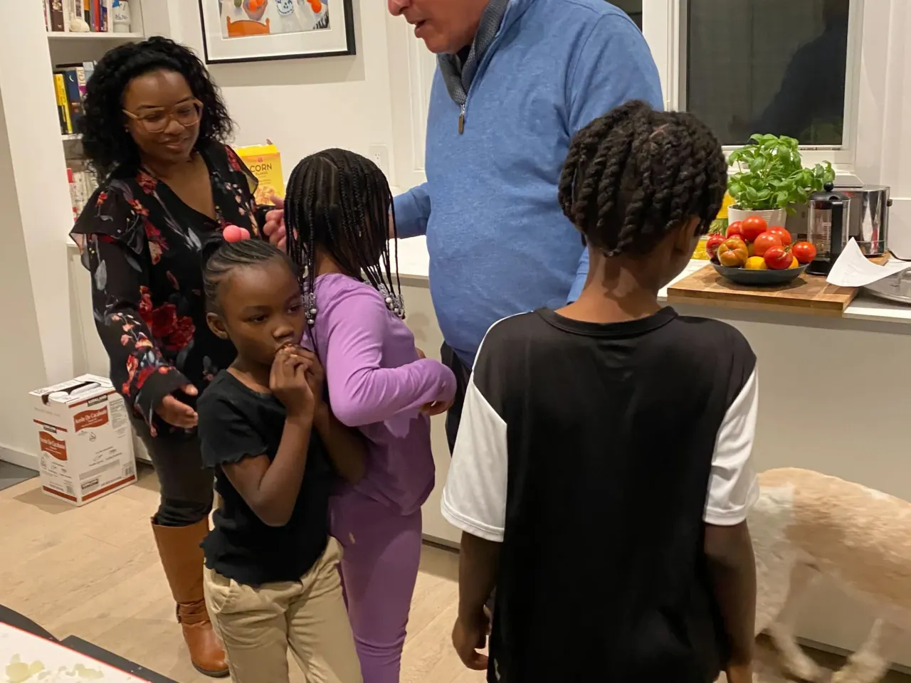 Get your kids in the kitchen with hands-on recipes 1 Ayesha Rascoe with her kids and food journalist, Mark Bittman.