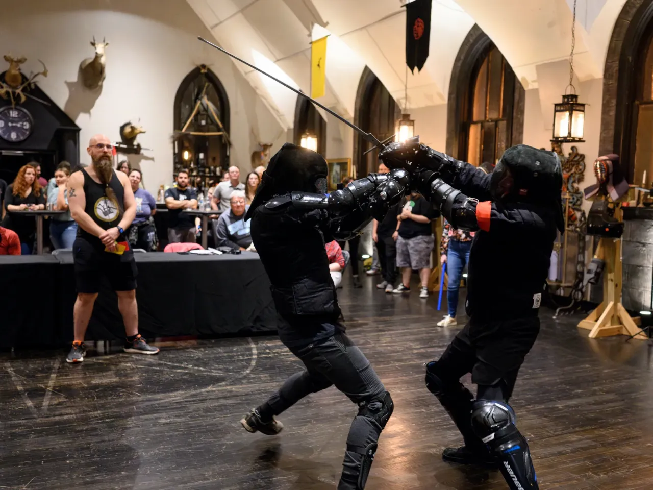 You can sword-fight at this club. But no politics allowed 1 The audience cheers on two sword fighters as they take part in a long-sword tournament hosted by Pittsburgh Sword Fighters.