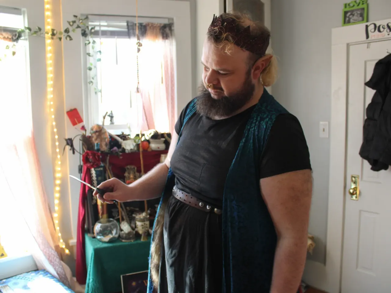 Orin Hart, a High Priestex of the Wichita-based Wiccan coven Circle of the Stag, holds a dagger used to cast circles during rituals.