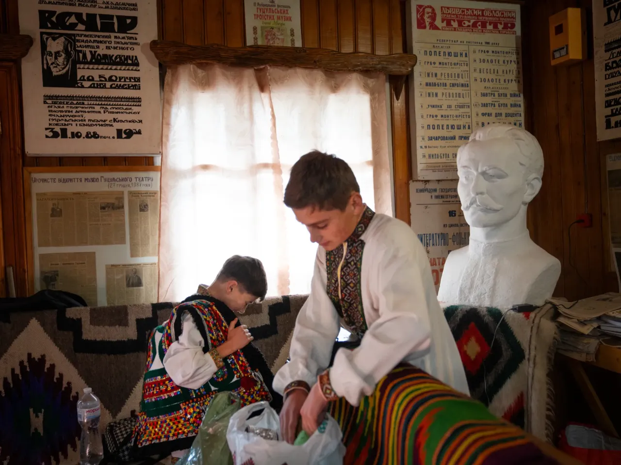 Vasyl Zhykaliak, 15, and his 11-year-old brother, Dmytro, prepare to rehearse a play at Hutsul Theater.