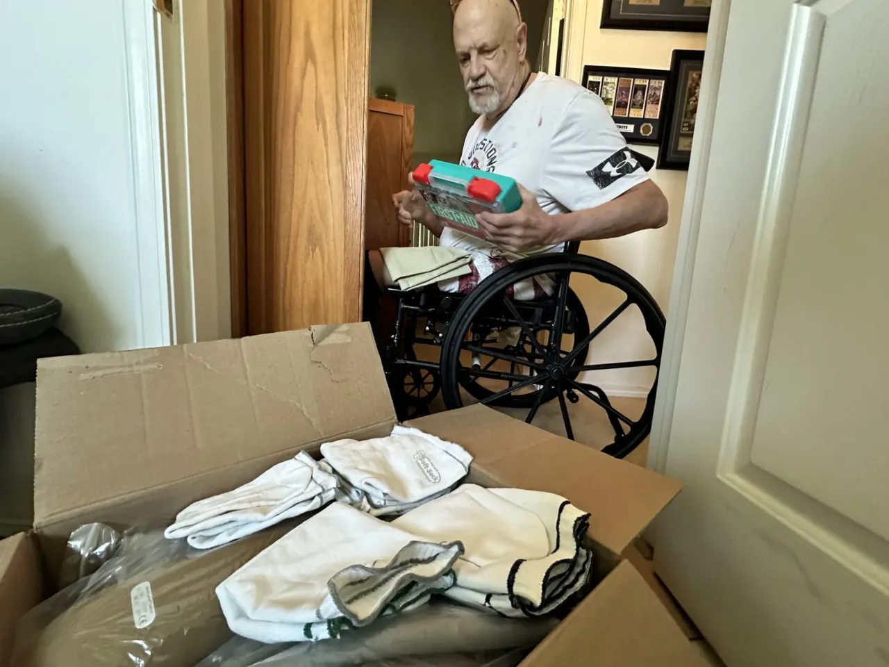 For homeless seniors, finding stable housing takes a village — and a lot of luck 1 Kim Hilton boxes up his belongings on July 9, 2024, shortly after his second leg was amputated. Living independently in the apartment became difficult, and after months of waiting, he got the call that an assisted living facility that takes his Medicaid waiver had a room that would soon be available.