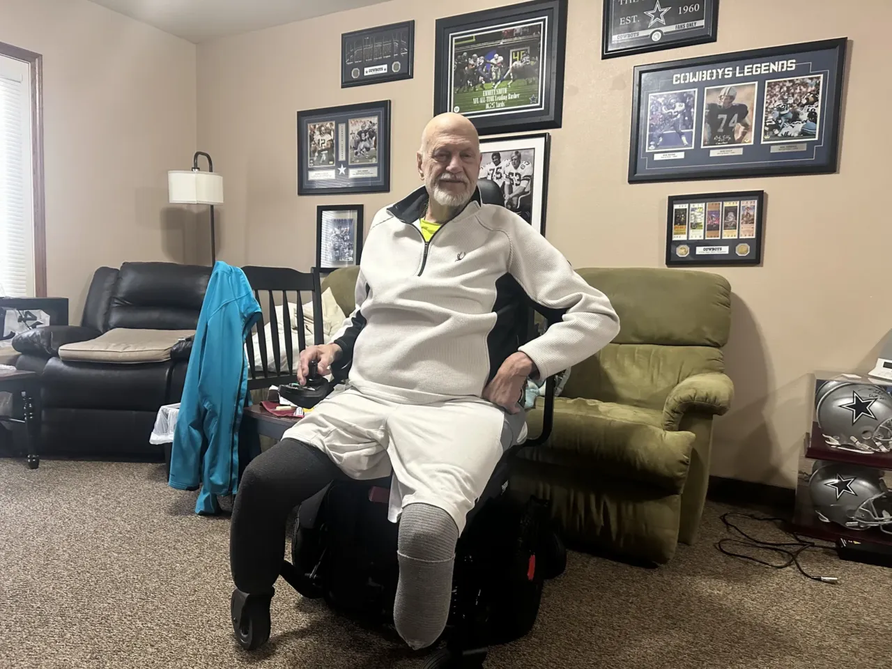 Kim Hilton inside his new apartment at an assisted living facility in Columbia Falls, Mont. Hilton can't afford the unit on his own, but after a long search was able to get one of the limited slots in a Medicaid program that helps pay for assisted living.