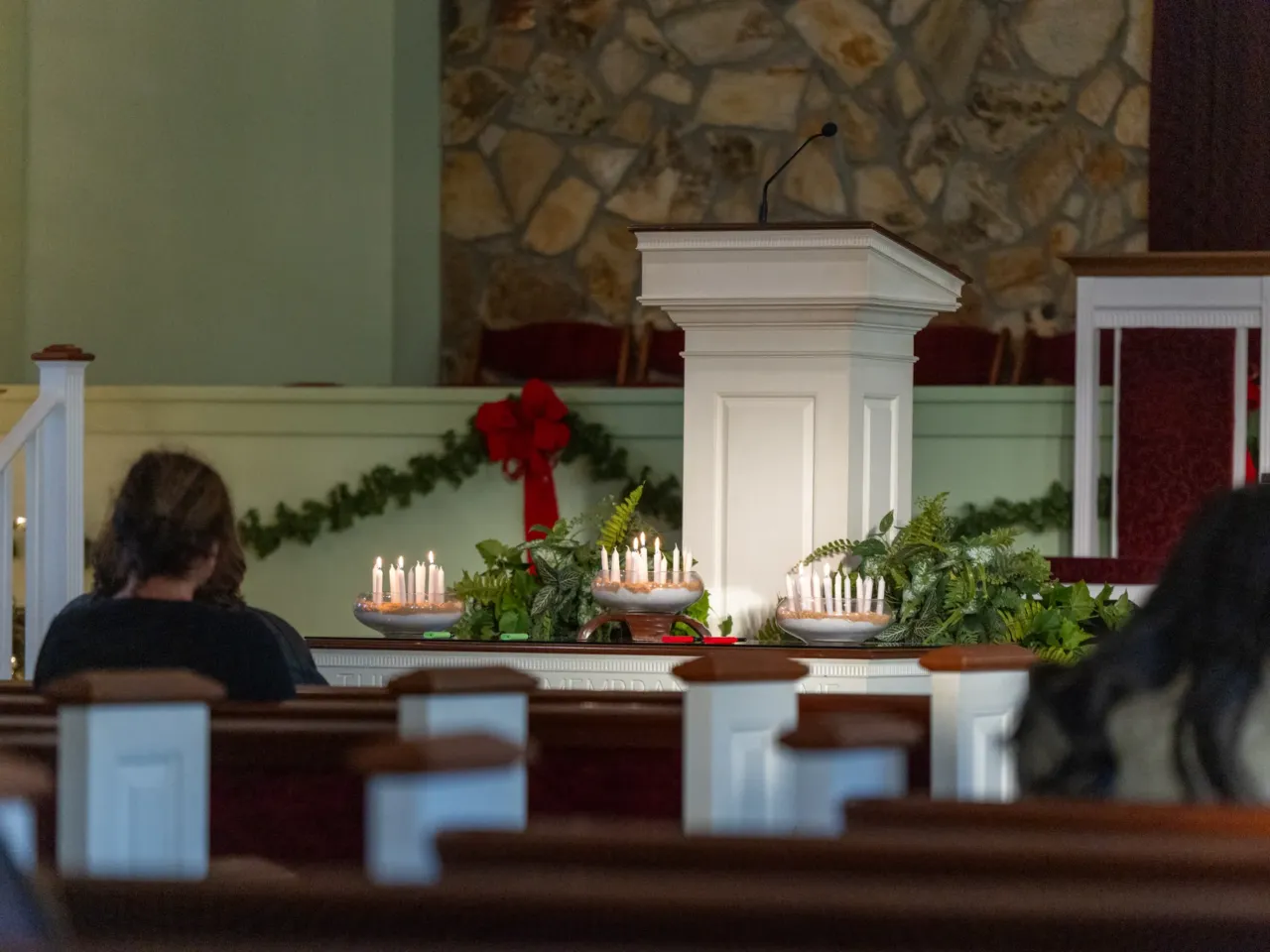In Jimmy Carter's hometown of Plains, people remember the former president 2 People gathered for a candlelight vigil at Marantha Baptist Church in Plains, Ga., on Monday. This was Jimmy Carter's church where he often preached and held Sunday school sermons.