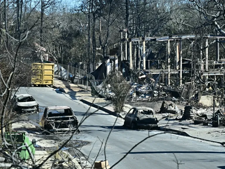 Photos: Southern California residents return to devastation as two major wildfires rage on