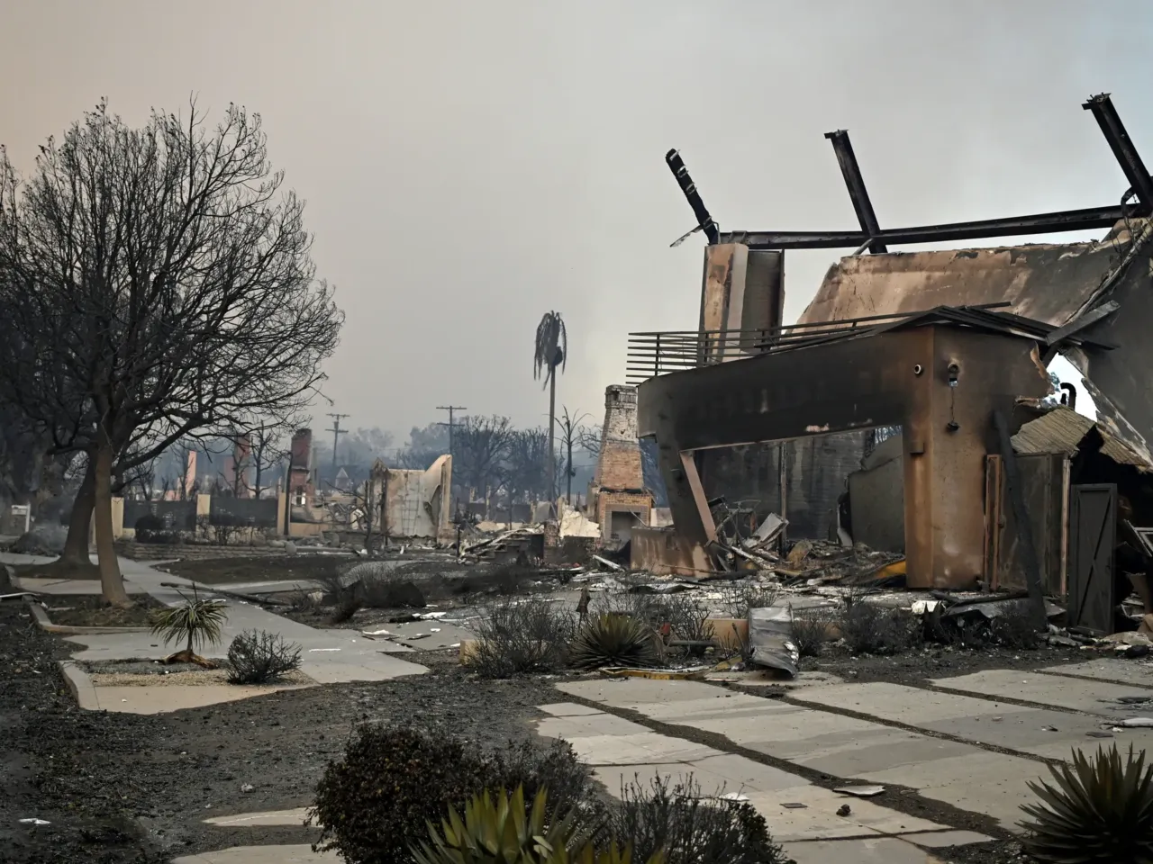 The remains of a burned home are seen after the home was destroyed by the Palisades Fire in the Pacific Palisades area of Los Angeles on Jan. 8.