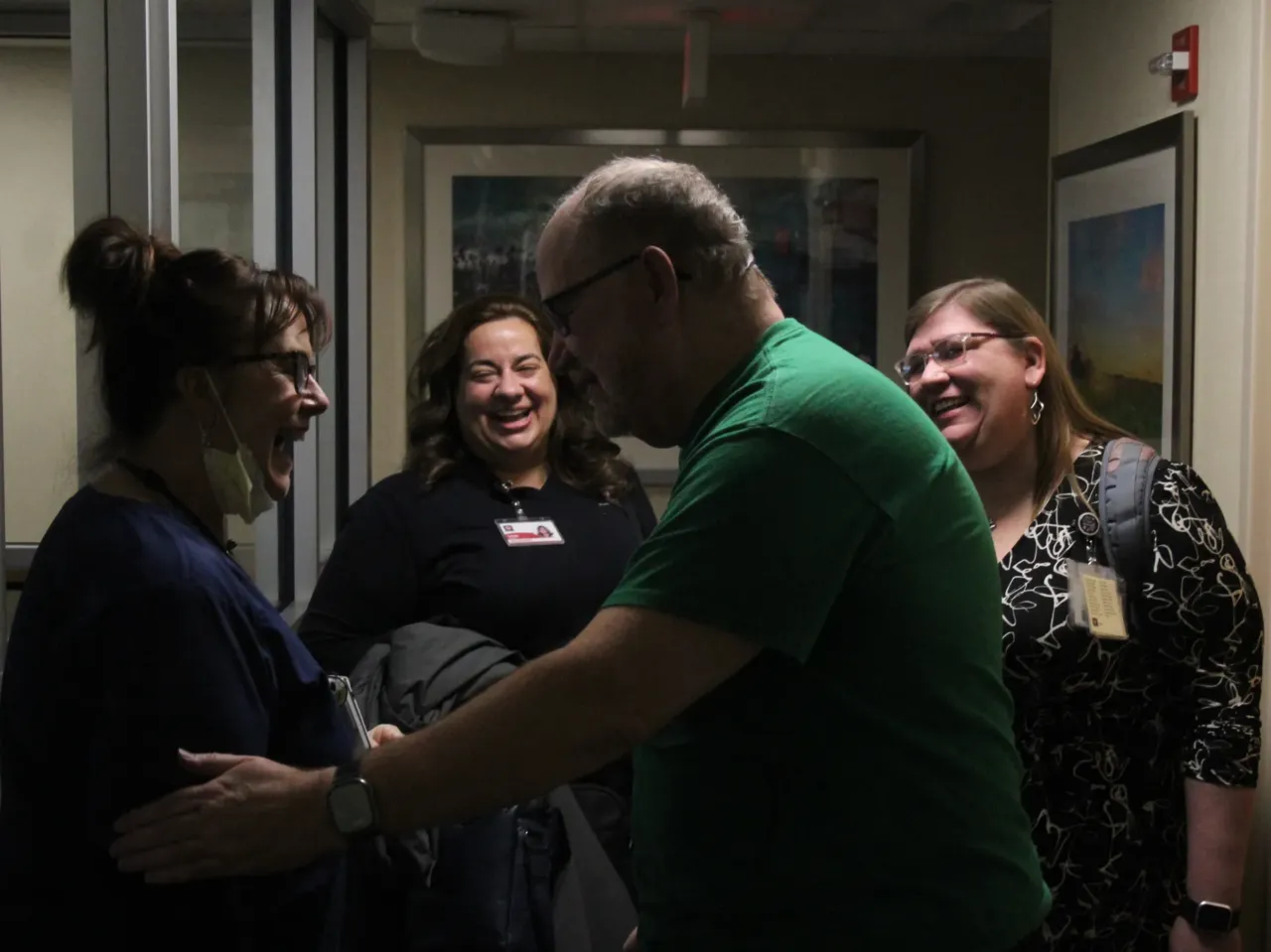 Timothy Moss (right center) was part of a program out of the Indiana University Health system, which connects hospital patients with "connectors" who help fill support needs, including spiritual needs, in the life of the patient.