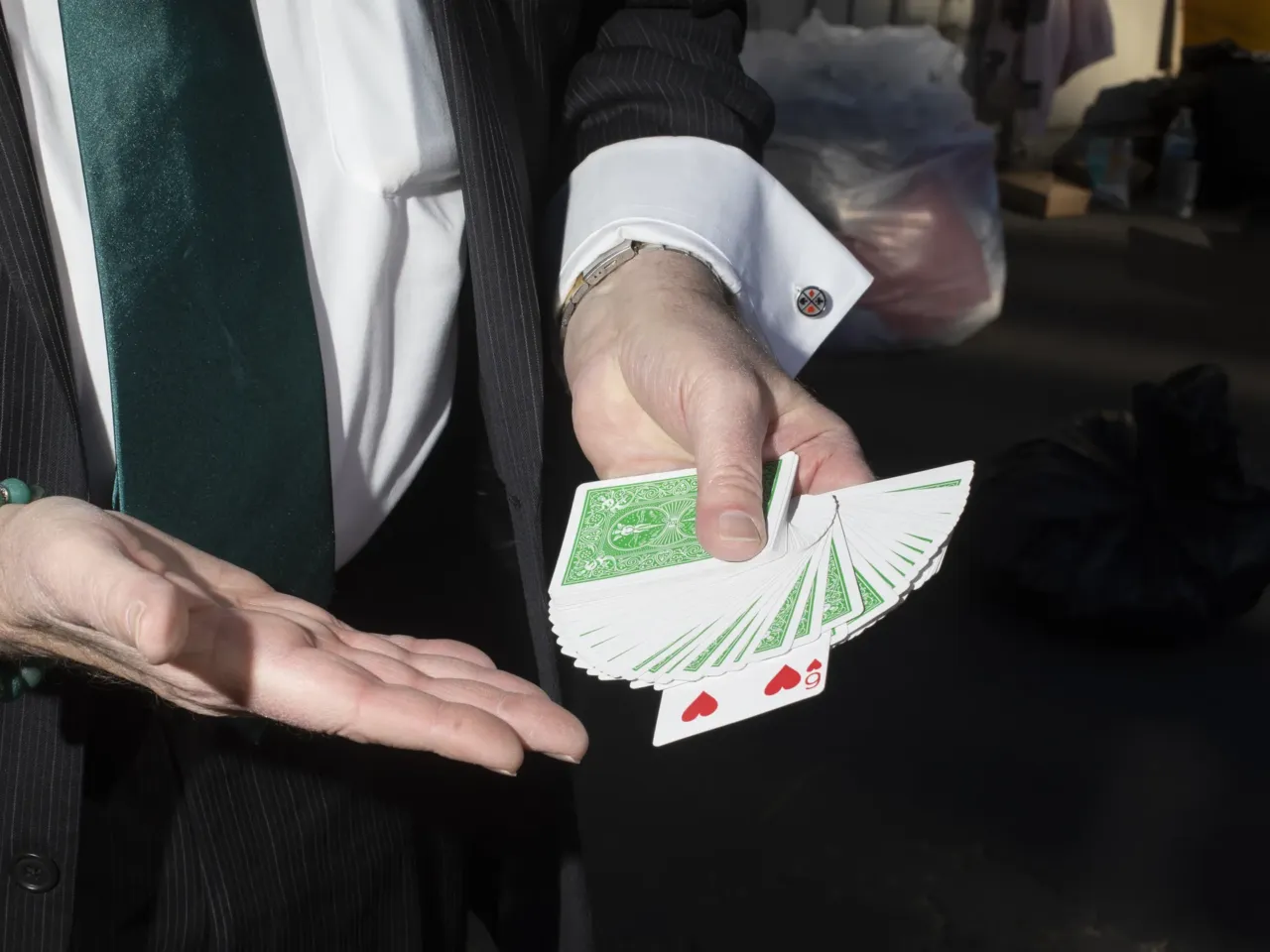 LA's Magic Castle offers a brief escape during the wildfires 3 Close-up magician Paul Green displays a deck of playing cards.