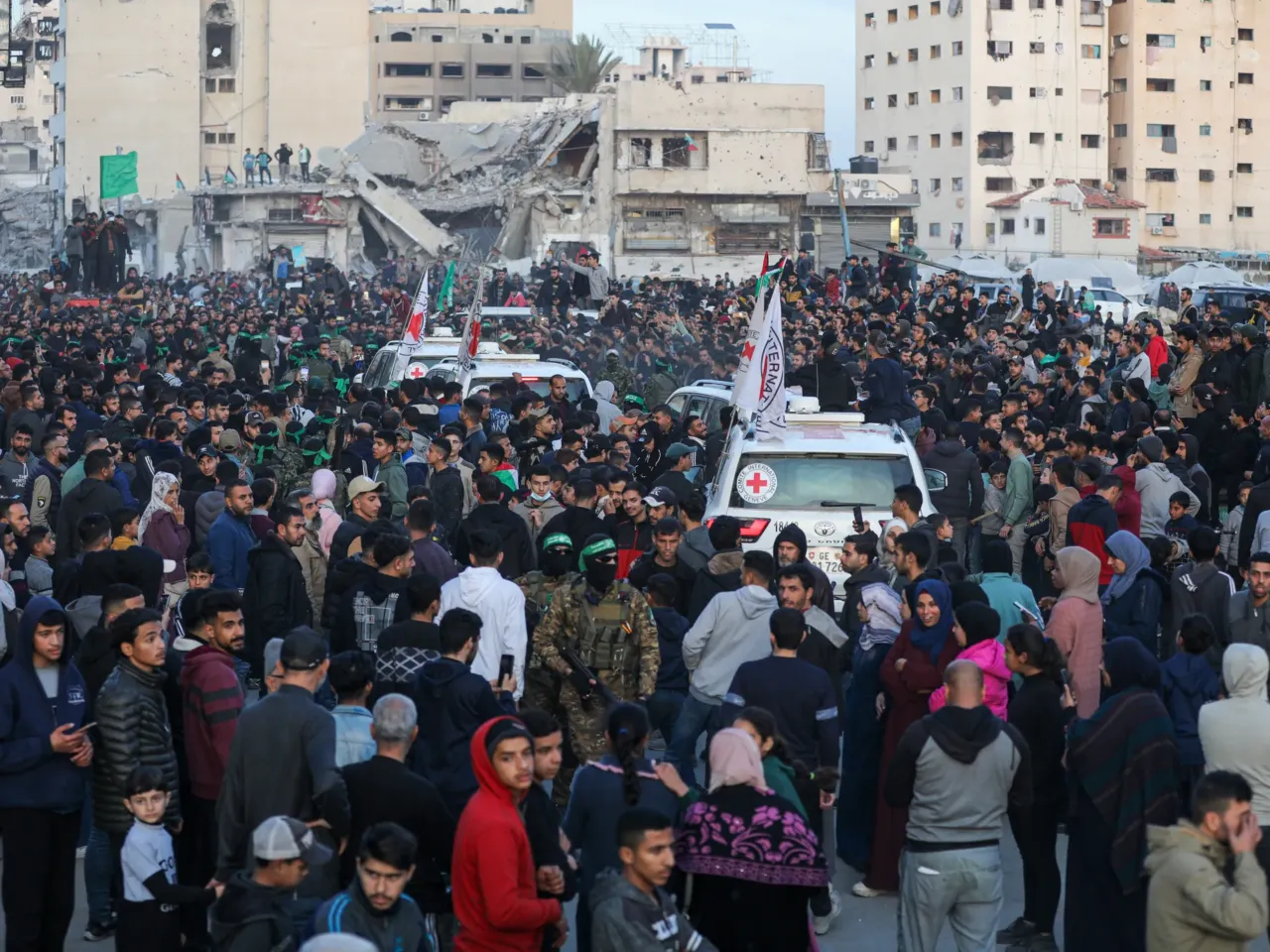 Al-Qassam Brigades hand over 3 female Israeli hostages to Red Cross at al-Saraya as part of 1st phase of ceasefire and prisoner swap deal between Israel and Hamas, in Gaza City, Gaza on Jan. 19, 2025.