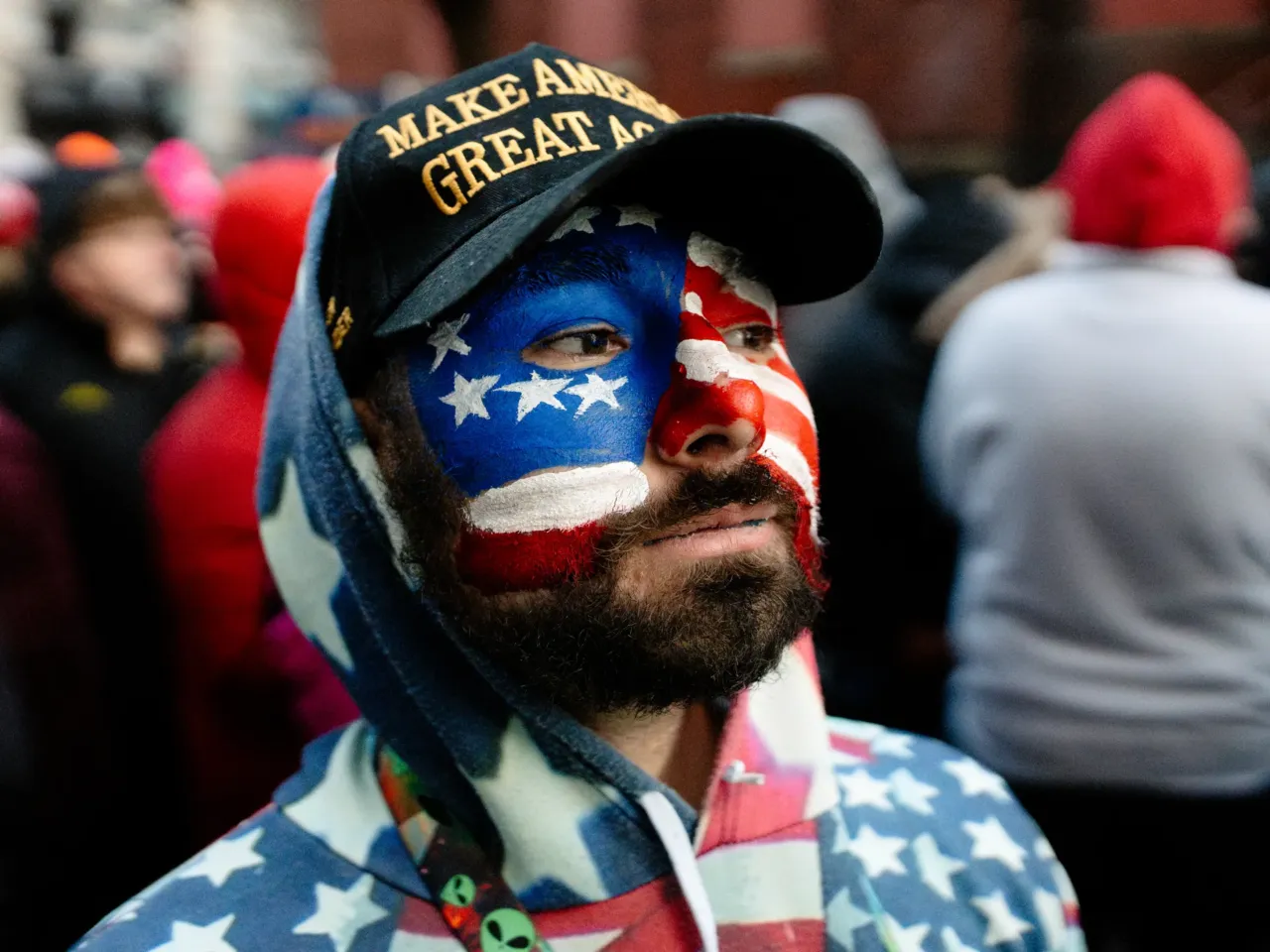 Brandon Reil, 26, of Pennsburg, Pa., stands for a portrait while waiting in line for a rally marking President Donald Trump's second inauguration at Capital One Arena on Monday, Jan. 20, 2025, in Washington D.C. "We need the wars ended. Hundreds of thousands and millions of innocent people are dying, so I trust Trump to get that done," he said. "I think Robert F. Kennedy — the Make America Healthy Again [campaign is] important right now. Our health is 70% of us are obese as Americans and we need to take our health more seriously."