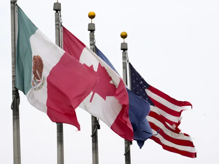 Trump puts Canada and Mexico tariffs on hold