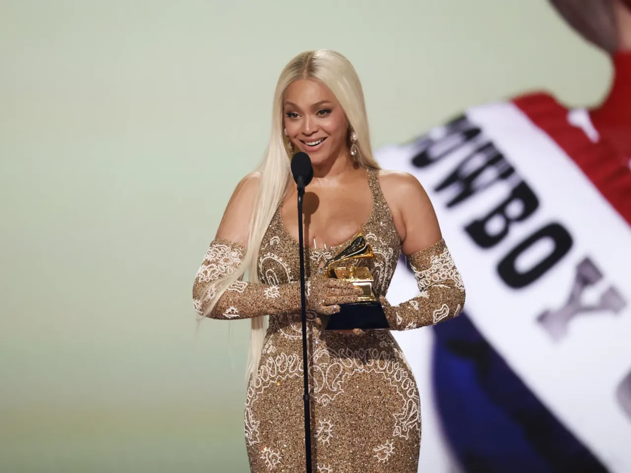 Beyoncé onstage Sunday night at the 67th Grammy Awards in Los Angeles, where her album Cowboy Carter received historic wins for best country album and album of the year.