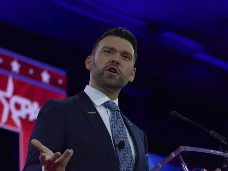 A far-right influencer is getting invitations to travel with Trump Cabinet members
