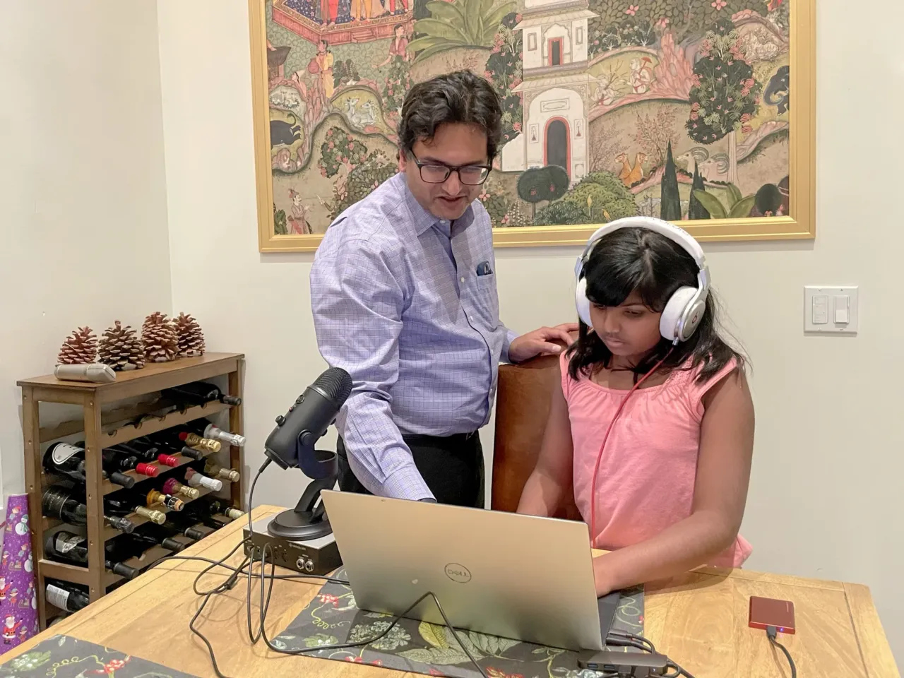 A 10-year-old's story of family immigration that spans three continents 1 Ameya and her father, Nikhil Desai, re-create their podcast recording set-up at the dining table at their home in San Jose.