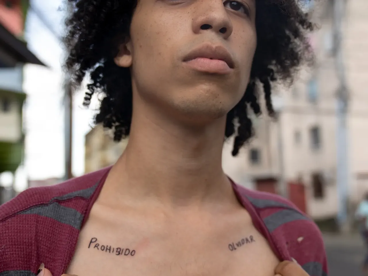 Isa Ashaw, 22, is a cultural ambassador for Movimiento Cultural Identidad. His tattoo reads "Never Forget," a common refrain to remember the events of the 1989 U.S. invasion of Panama.