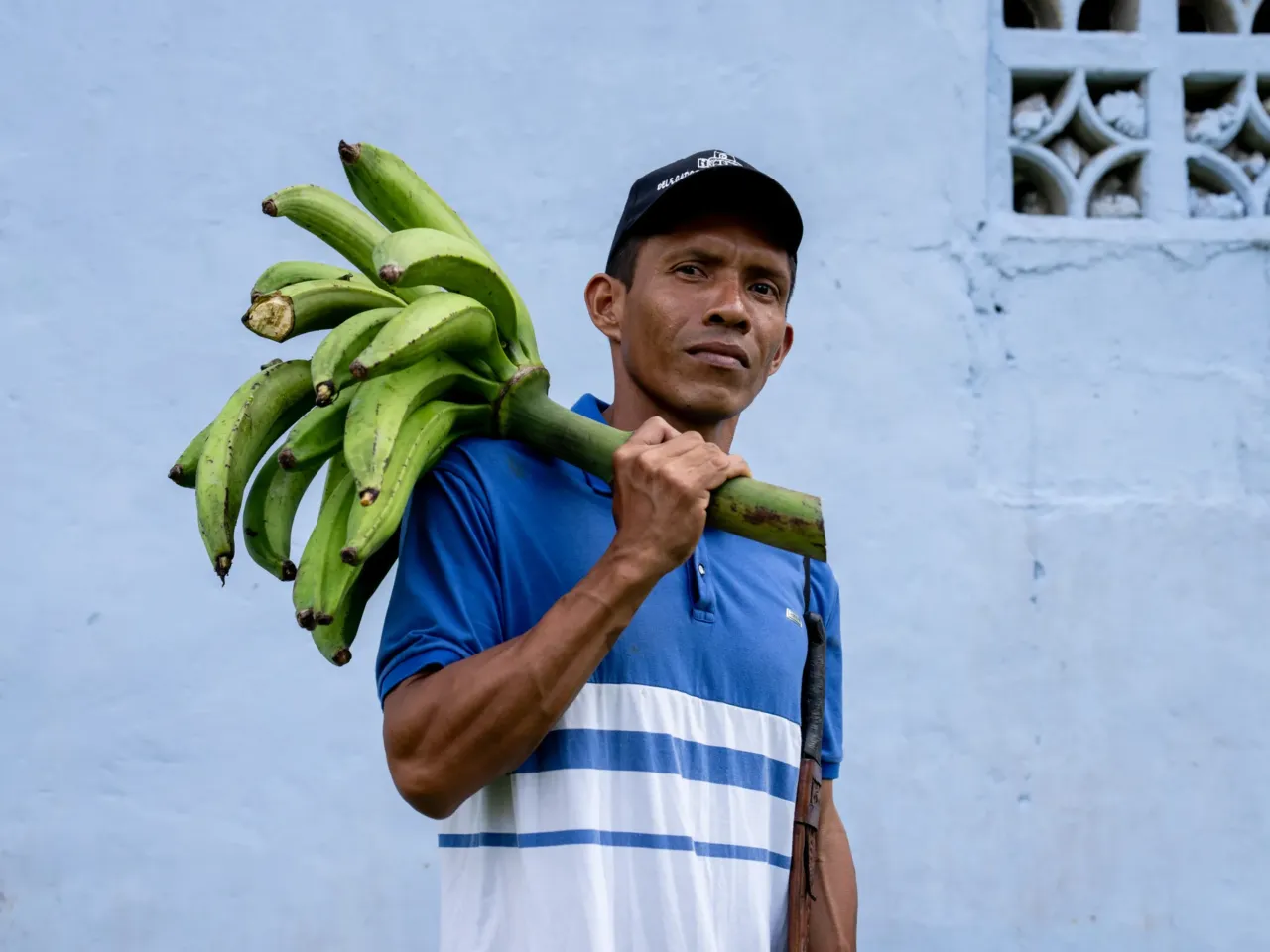 The Panama Canal needs more water. The solution is a dam that could displace thousands 6 Olegario Cedeño, 38, holds plantains outside a church in Limón de Chagres, Panama. Cedeño is among several dozen community members who are rallying against the planned construction of the Río Indio dam project.
