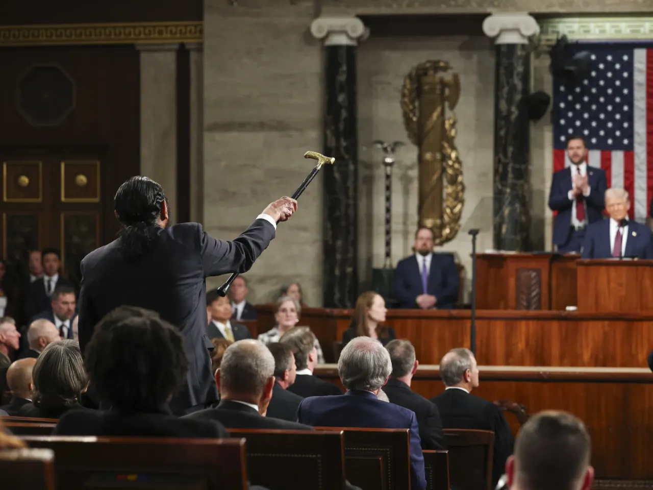 From cheers to protests, here's a look inside the chamber during Trump's speech 3 Rep. Al Green, D-Texas, left, shouts as President Donald Trump addresses a joint session of Congress at the Capitol.