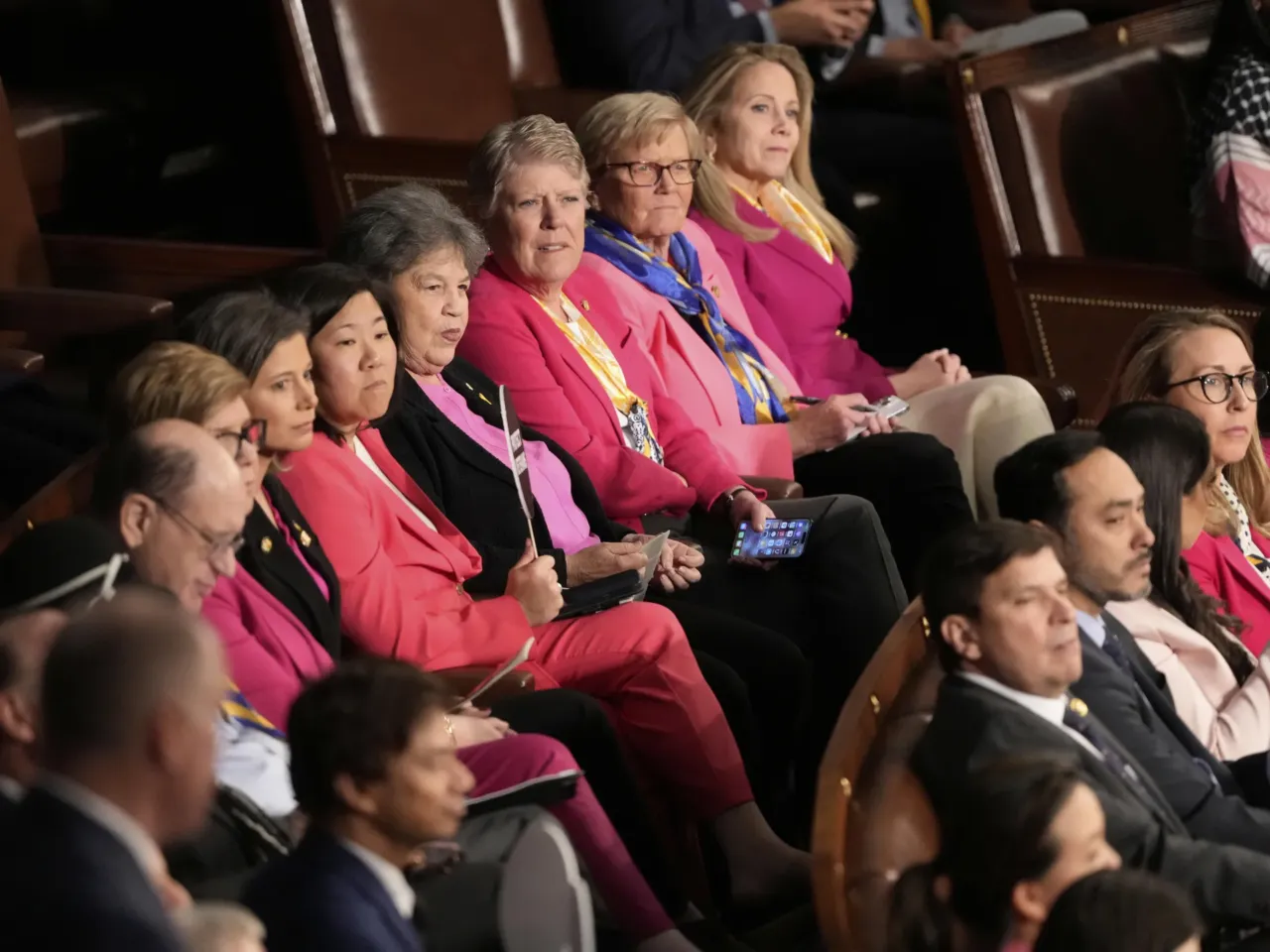 From cheers to protests, here's a look inside the chamber during Trump's speech 5 Democratic members of Congress listen as President Trump addresses a joint session of Congress at the Capitol.