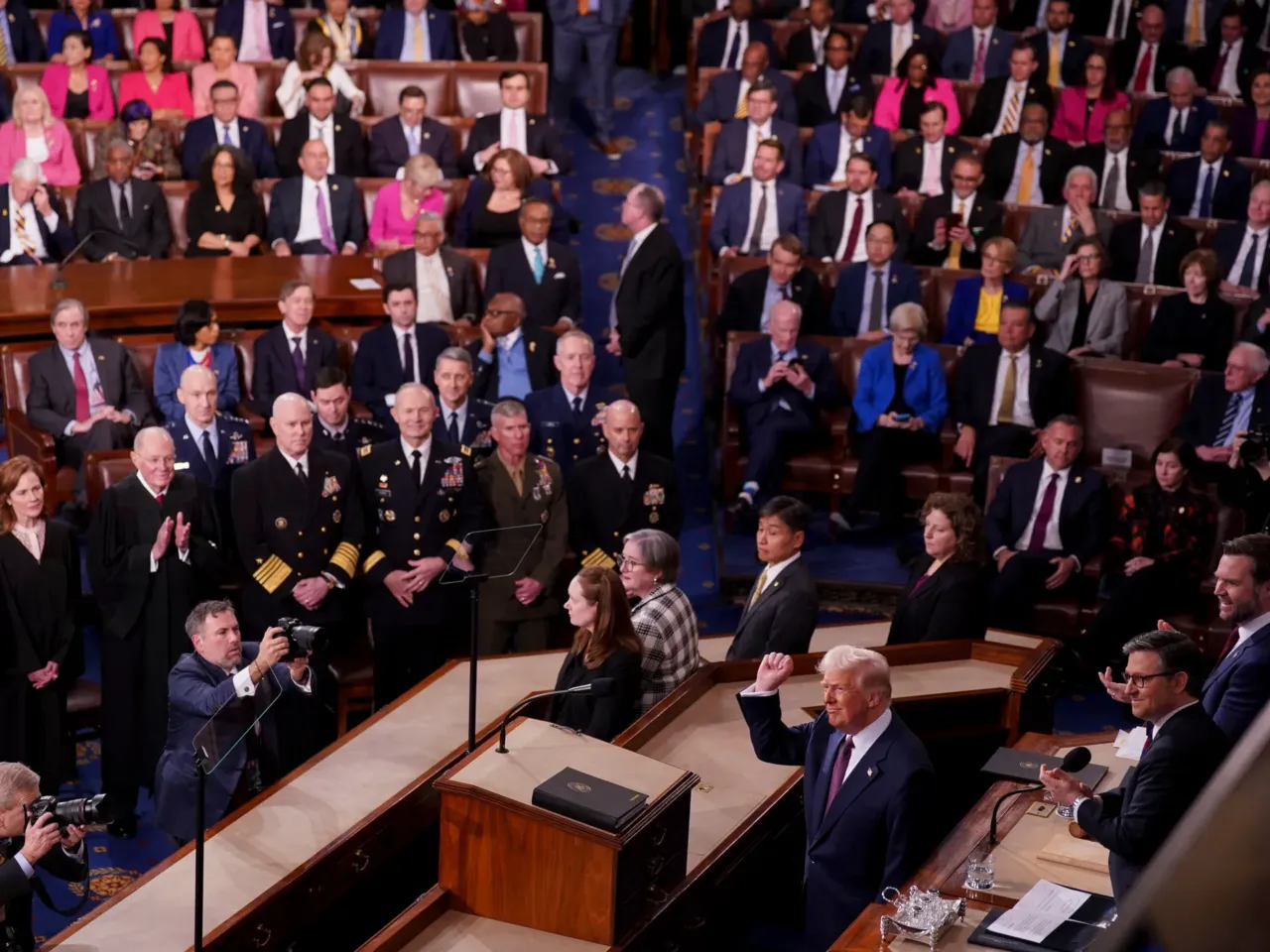 From cheers to protests, here's a look inside the chamber during Trump's speech 10 President Trump arrives for a joint session of Congress in the House Chamber of the Capitol.